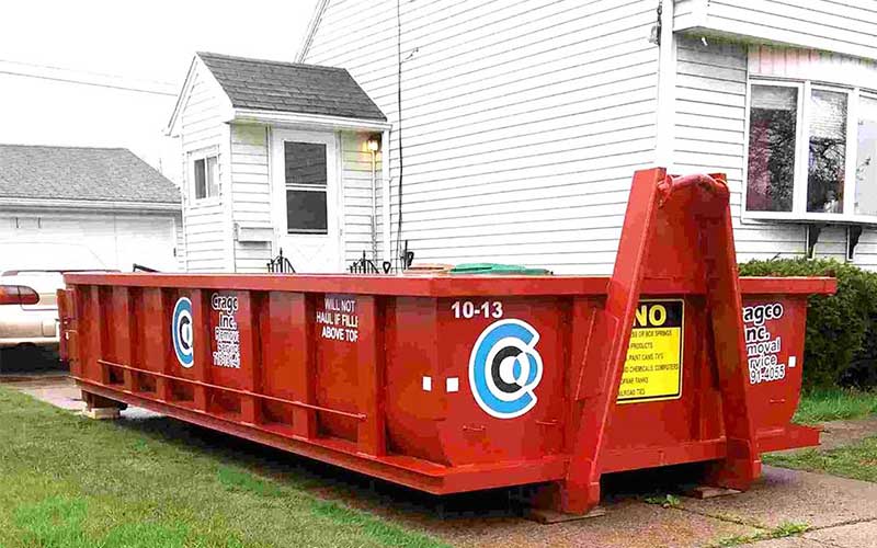 10 yard Cragco dumpster in a Buffalo, NY driveway